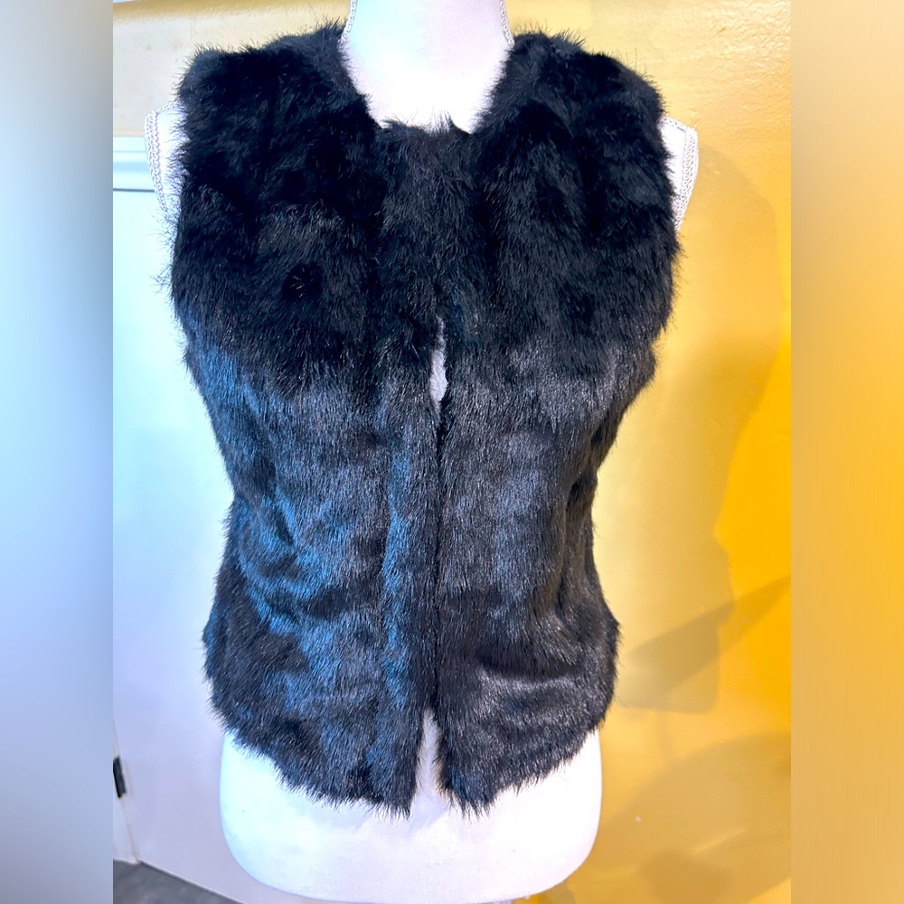 Faux fur vest. Excellent for over crop tops ~